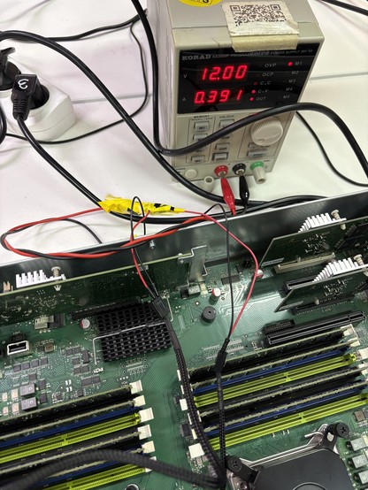 Closeup of bober-taped external-psu-powered water cooling.