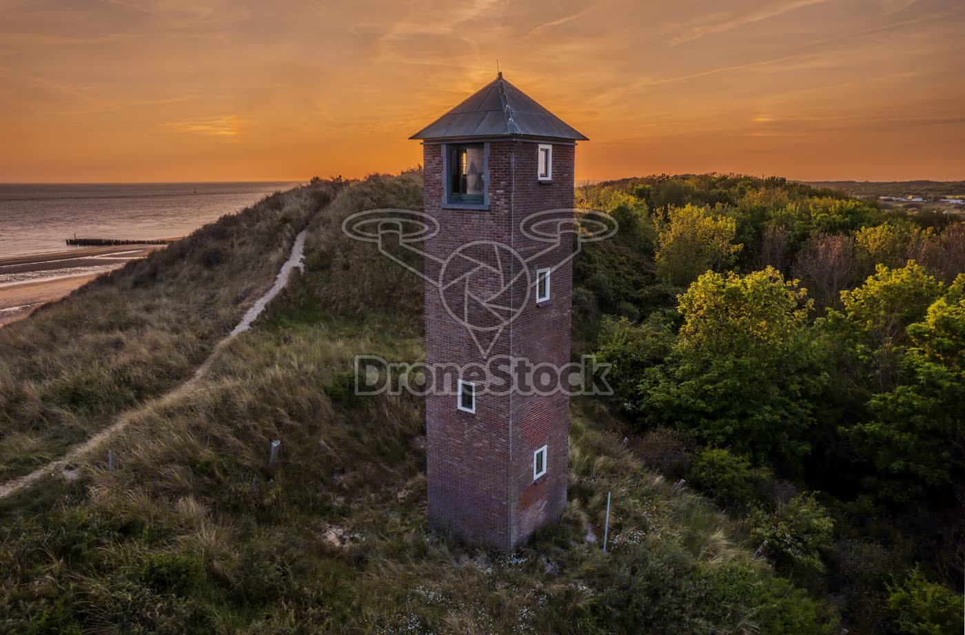 Lichtbaken Het Kustlicht Zoutelande in zonsondergang