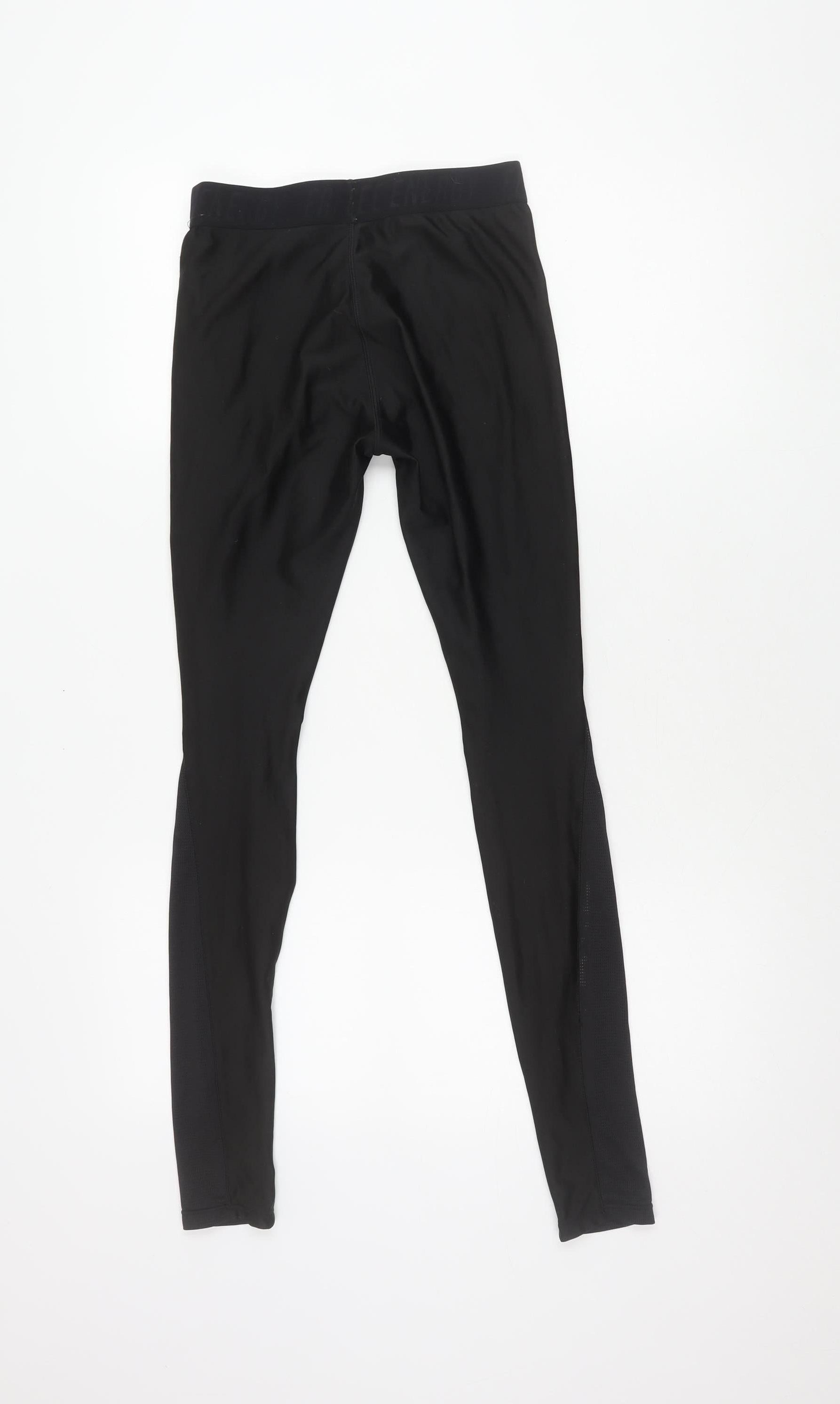 DECATHLON Unisex Kids Compression Leggings Size Small Multicoloured Geometric - label detail