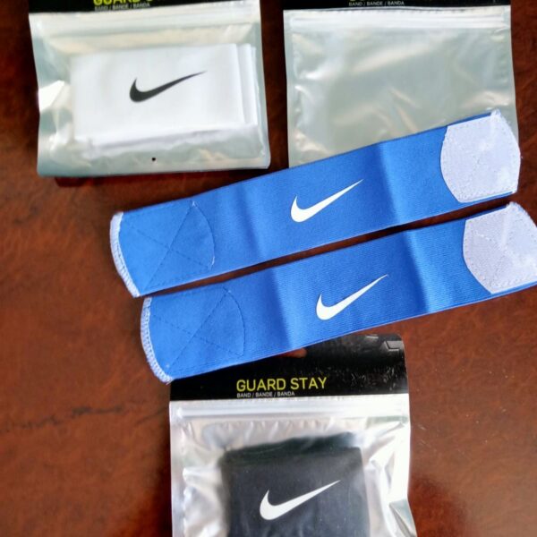 Фіксатори - ЛИПУЧКИ для футбольних щитків (к-т з 2-х шт), кольори в асортименті