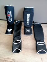 Защита голени и стопы с фиксатором FISTRAGE, размеры S-XL, цвет - чёрный