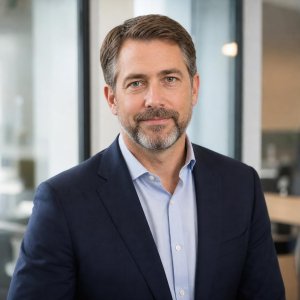 Professional headshot of Andrew Collins