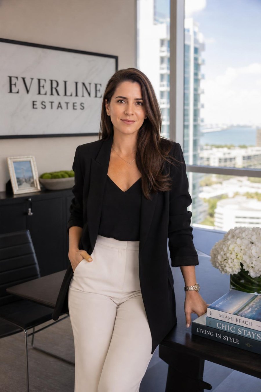 Professional portrait representing a refined luxury real estate advisor