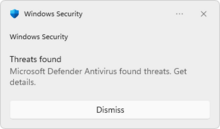 Screenshot of Windows Defender notification toast in Windows 8, reporting taking action to clean detected malware.