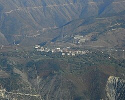 Krastë seen from the summit of Noi i Madh (1848 m), at a distance of 7.7 km (5 mi) as the crow flies.