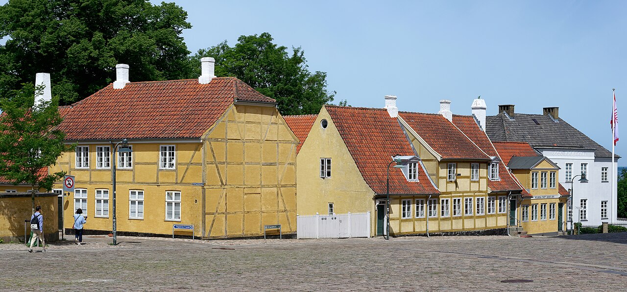 Traditional houses in Roskilde's old town — the city itself is small, with only about twenty hotels in the city center, which is why accommodation sells out so early during the festival.