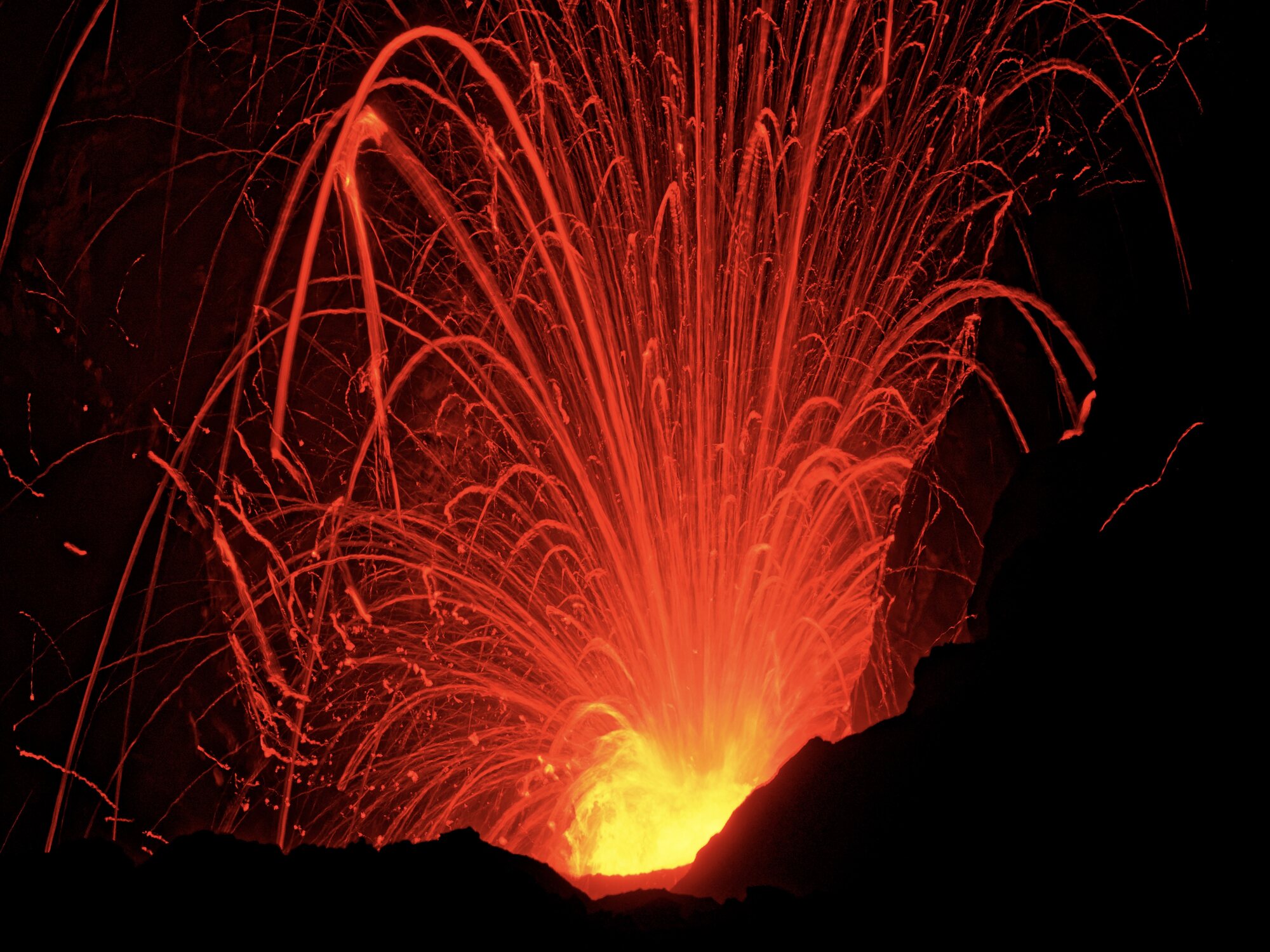 Long-exposure lava trails at Mount Yasur