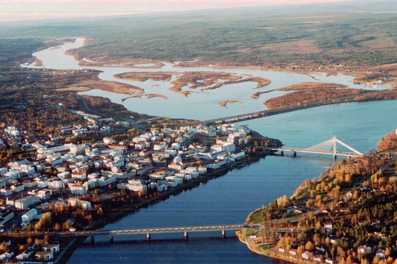Autumn aerial view of Rovaniemi city center, where the Ounasjoki and Kemijoki rivers meet, crossed by several bridges