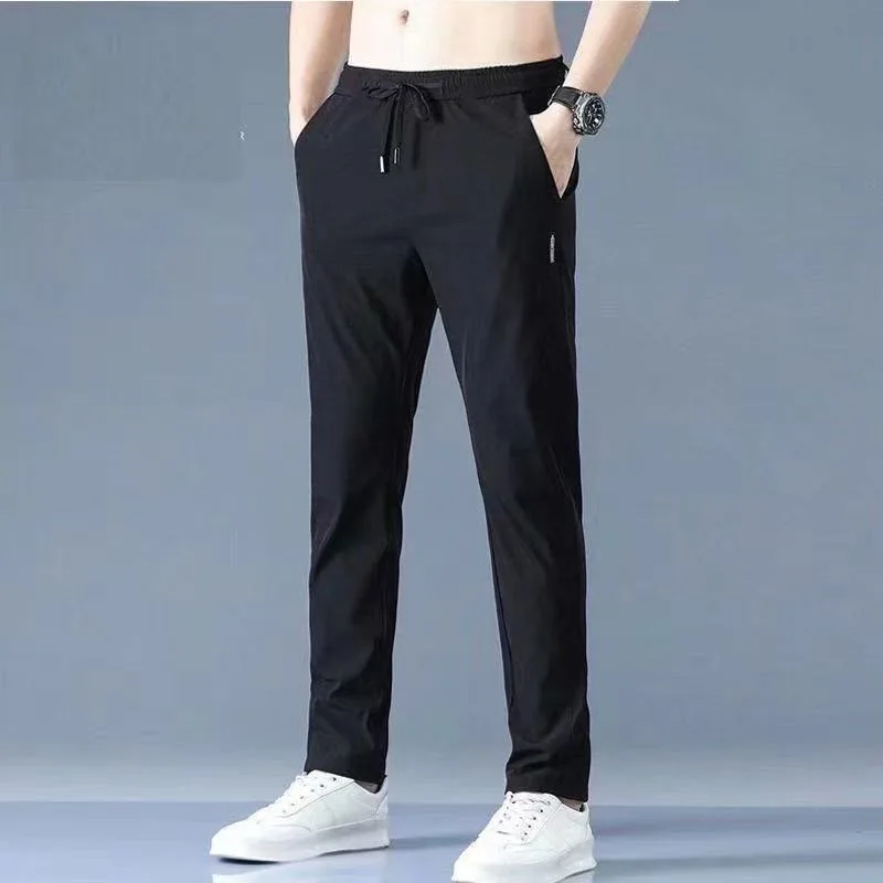 2024 Korean version of ice silk thin breathable casual pants, men's summer trend