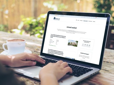 Klantenportal van vastgoedfinancierder Mogelijk in beeld op een MacBook