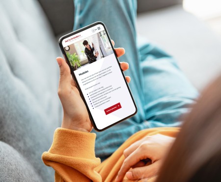 Website van durfteverbinden.nl op een mobiele telefoon.