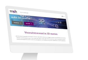 Laptop en telefoon met daarop de website van M&H 3D Reverse