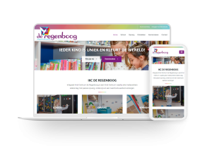 Laptop en telefoon met daarop de website van De Regenboog