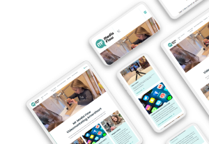 Laptop en telefoon met daarop de website van MF Media Flow