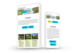 Laptop en telefoon met daarop de website van Het Groene Huis Amersfoort