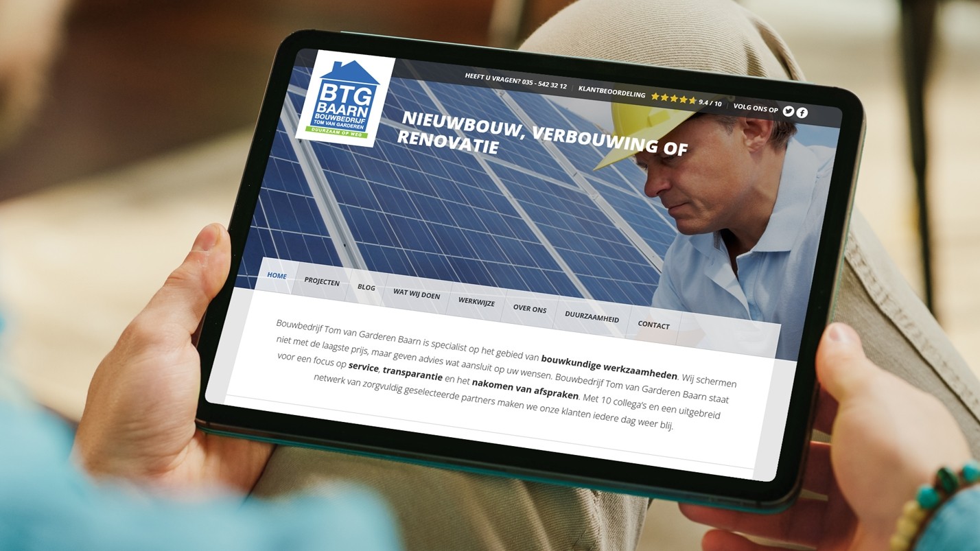 iPad met de website van Bouwbedrijf Tom van Garderen Baarn in beeld