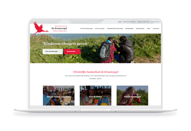 Laptop en telefoon met daarop de website van Christelijke basisschool de Kraanvogel