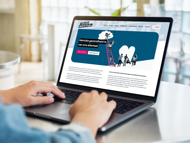 Macbook met de website van Missie Mentaal in beeld