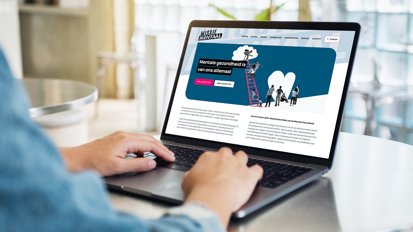 Macbook met de website van Missie Mentaal in beeld