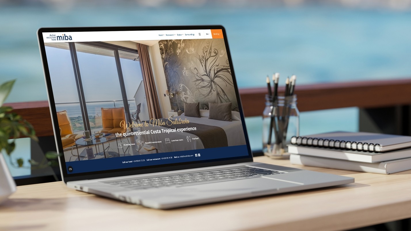 Een laptop met daarop de website van Hotel/Restaurant MIBA  afgebeeld