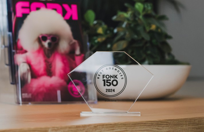 Websteen FONK150 award en FONK tijdschrift in de achtergrond