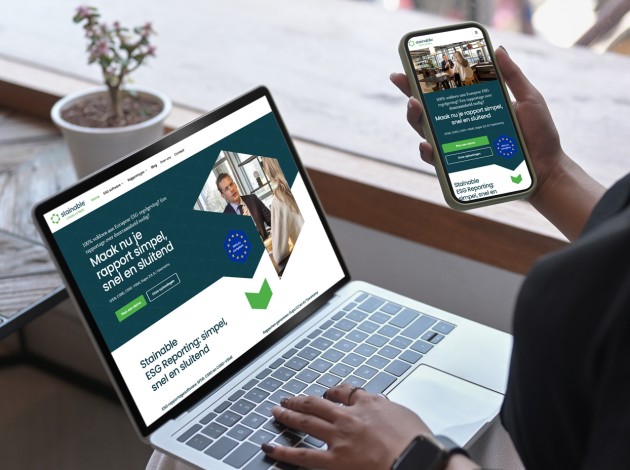 Macbook met de website van Stainable in beeld