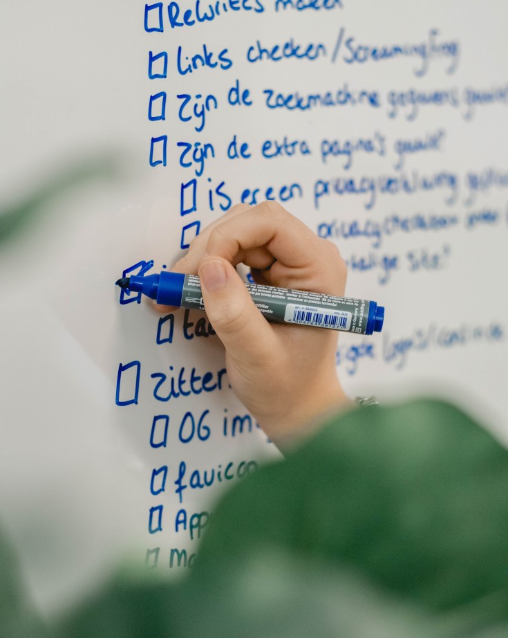 Aantekeningen op een whiteboard gemaakt door een collega van Websteen