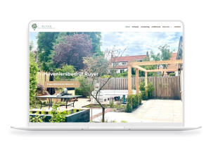 Laptop en telefoon met daarop de website van Hoveniersbedrijf Ruyer