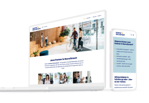 Laptop en telefoon met daarop de website van Partner in Recruitment