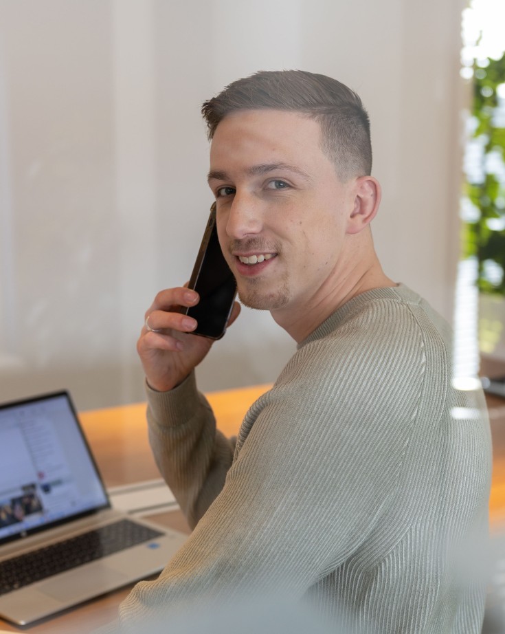 Chris is having a phonecall