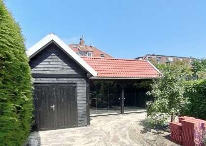 Trendhout douglas overkapping met glaswanden- Almere Buitenleven