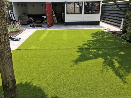 Kunstgras en bestrating Bussum