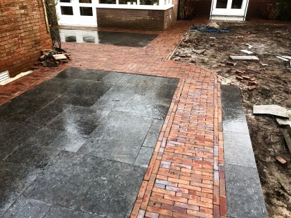 Tuinaanleg en sierbestrating in Huizen