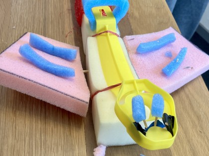 De Afvaljuf - Kinderrijk - plastic afval vlinder