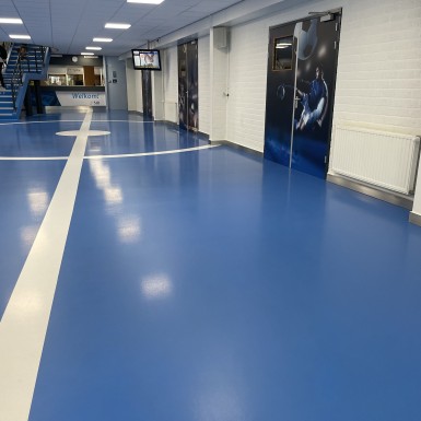 Kunststof gietvloer sporthal