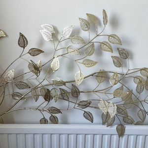 Décoration murale branche dorée 
