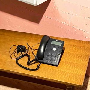 Téléphone fixe en bon état 