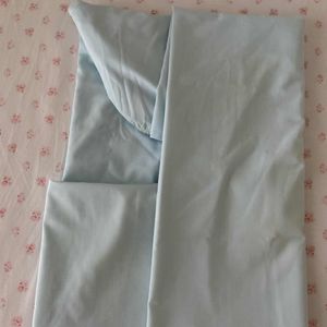 Donne drap housse bleu ciel 