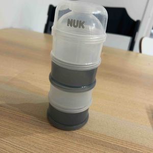 Boîte dosseuse lait en poudre