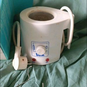Ancien chauffe biberon 