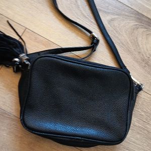 Sac à main cuir noir à réparer 