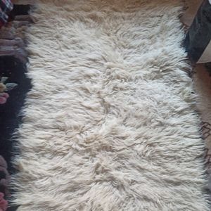 Tapis poils blanc 130x80