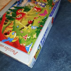 Puzzle, bon état boîte un peu abîmé complet.