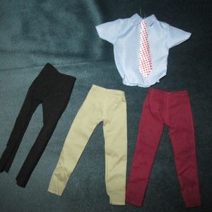 Lot de 4 Vêtements pour poupée neufs