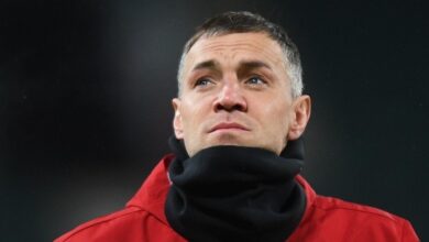 Денис Мацуев и Артём Дзюба на фоне стадиона