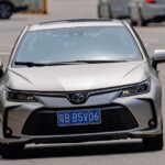 A striking Toyota Corolla showcasing its 60th anniversary with a hybrid design