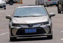 A striking Toyota Corolla showcasing its 60th anniversary with a hybrid design