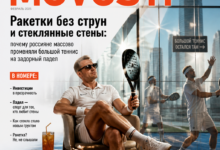 Игроки в падел на фоне стеклянных стен