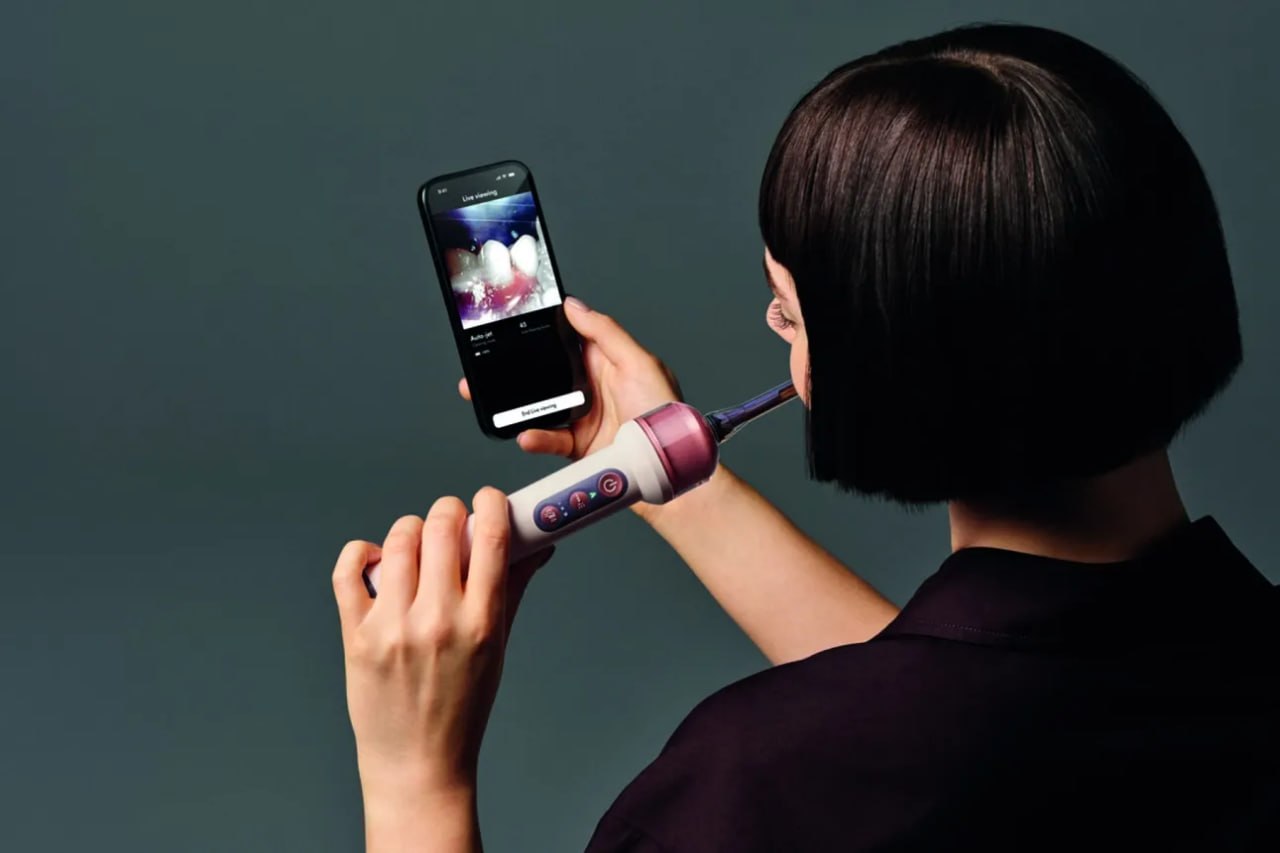 A futuristic representation of a neural network integrated into dental care, showcasing Dyson's innovative technology.