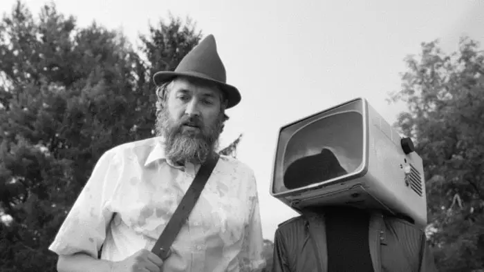 Obex 2025 tv head character black and white still